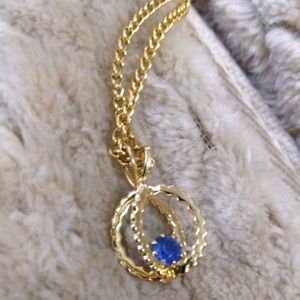 Gorgeous Gold Toned Necklace with Bright Blue Stone. Chain is 17 1/2" long.